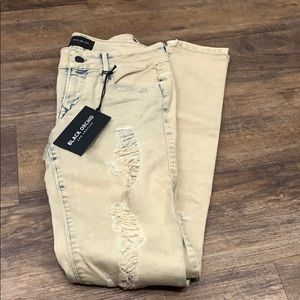 Black Orchid size 26 distressed skinny leg jeans